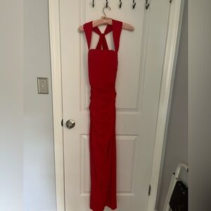 Vibrant red prom dress with side slit and halter neck